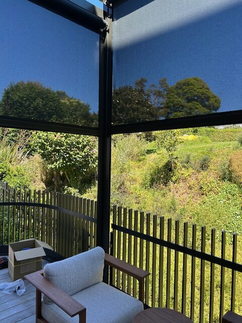 Motorised outdoor blinds transforming a Ponsonby hospitality space into a comfortable, weather-protected environment